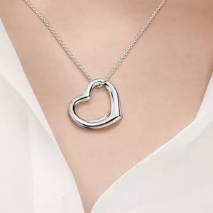 Authentic Tiffany & Co Open Heart 925 Silver Pendant